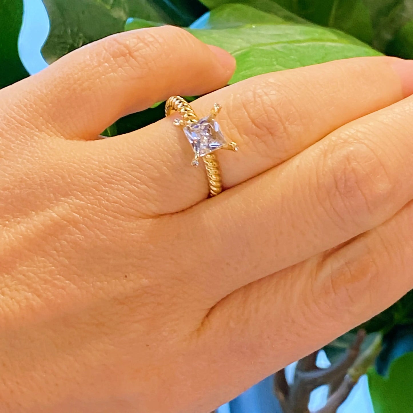 Gleaming Cubic Solitaire Ring